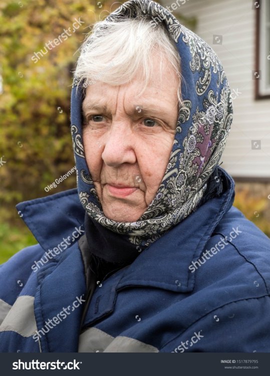 stock-photo-elderly-old-woman-in-a-traditional-russian-shawl-in-the-garden-real-people-everyday-life-1517879795.jpg